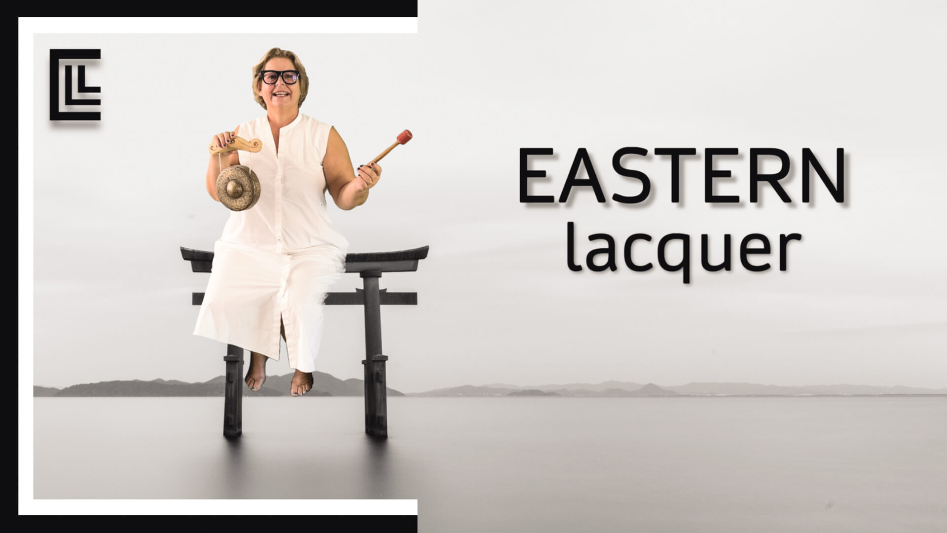 Claire Lassonnery, Eastern Lacquer, artist talk video, white outfit, holding instrument, minimalist Japanese-inspired setting, water in background